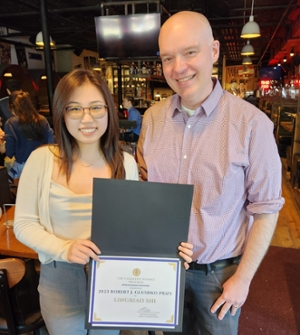 Winner, Lingxiao (Lindsay) Shi and Dr. Matt Goldrick, Cognitive Science Program Director, at CogSci Fest May 2023